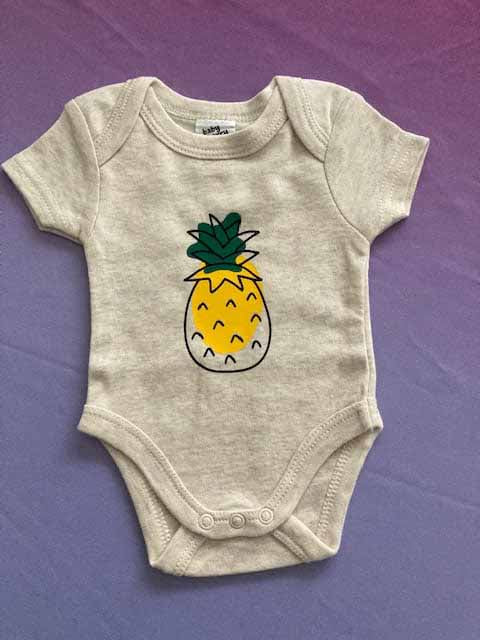 Custom printed baby bodysuit featuring hand-drawn illustration