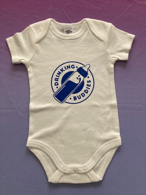 Cream cotton baby bodysuit with 'drinking buddies' custom print design featuring a baby bottle, short-sleeve summer-themed infant onesie for baby girls by AJ's Infinity Design